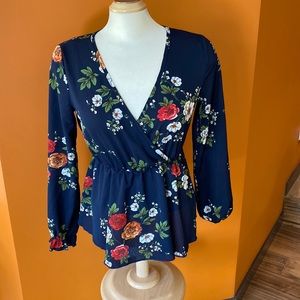 Shein blouse in beautiful floral pattern size extra small.